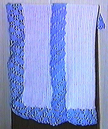 White blanket with Blue trim